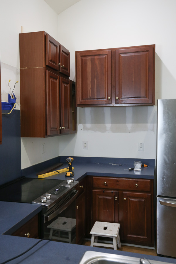 how to add shelves under kitchen cabinets
