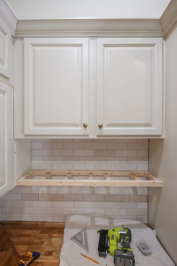 installing diy floating kitchen shelves