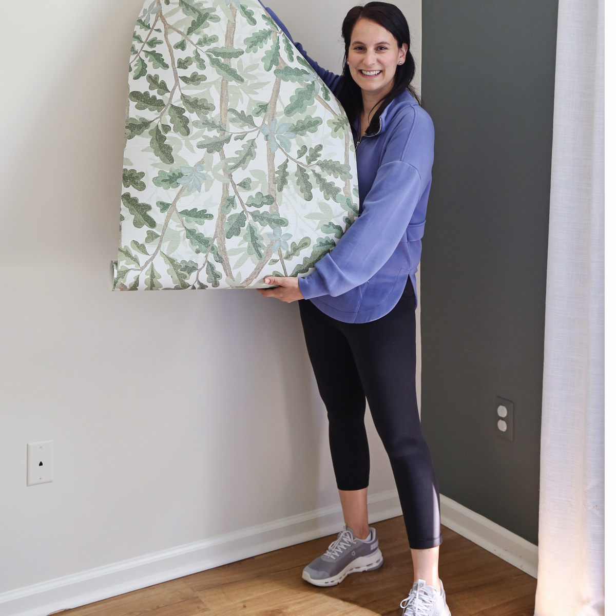 installing woodland tree peel and stick full wall wallpaper on boy bedroom wall