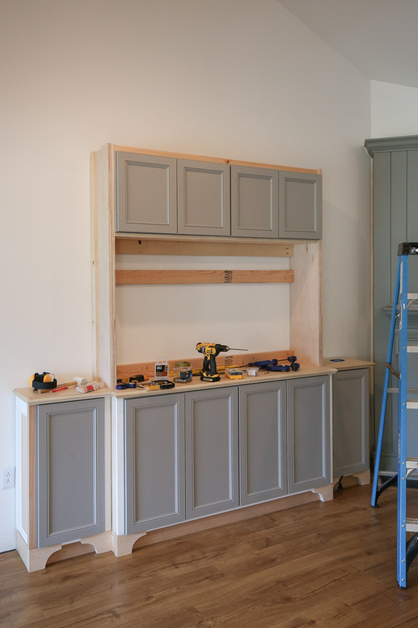 adding top cabinets to diy built in cabinets living room