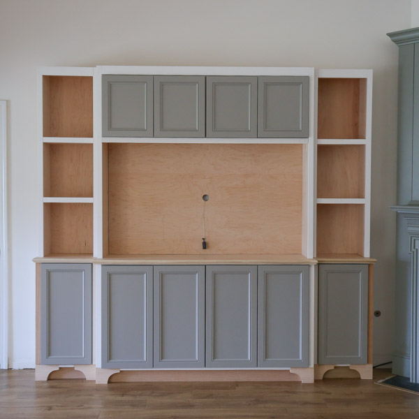 diy built in bookshelves with cabinet below and diy built in entertainment center