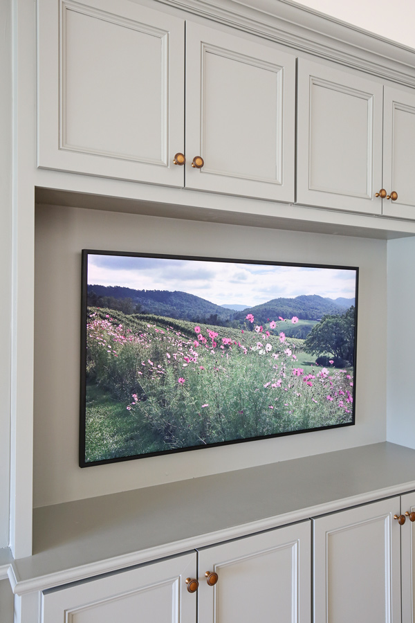 Frame TV on diy built in entertainment center and diy built in cabinets living room