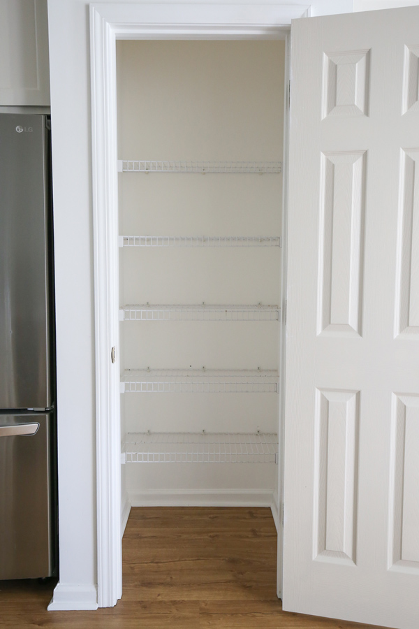 wire shelves before wood shelf covers