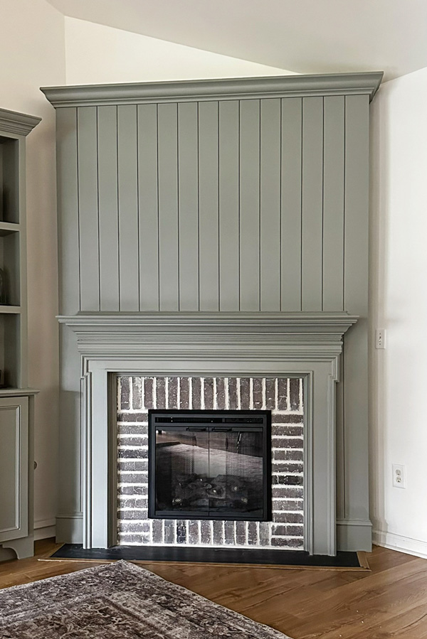 brick surround fireplace with shiplap before decor