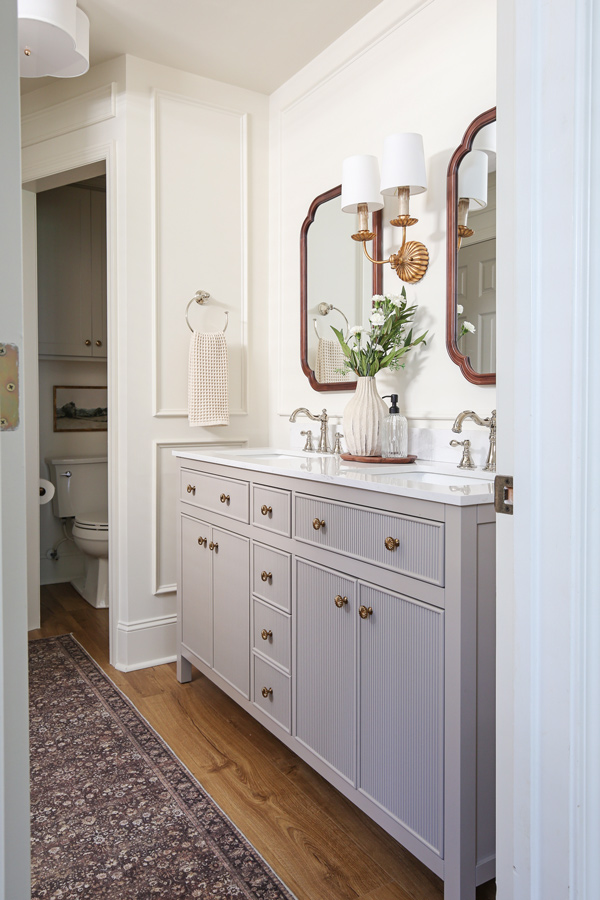 Primary bathroom makeover before and after. Greige fluted bathroom vanity