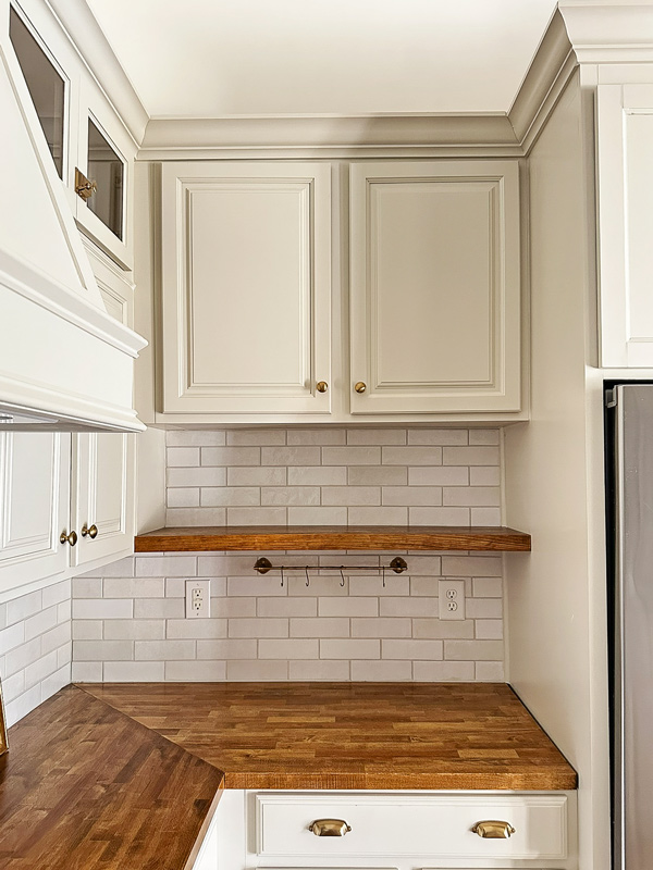 empty kitchen shelf and kitchen rail