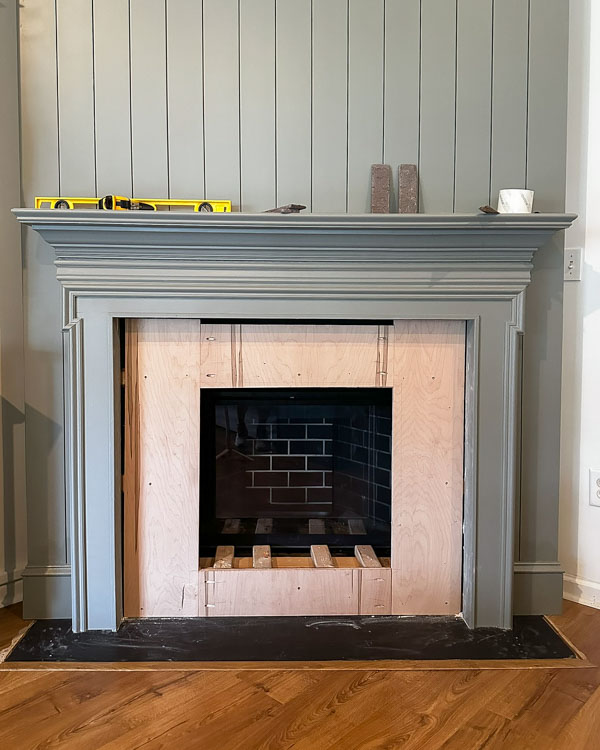 plywood backing for brick fireplace DIY