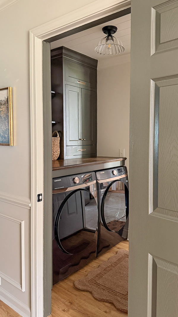 small laundry room makeover before and after with countertop cabinets