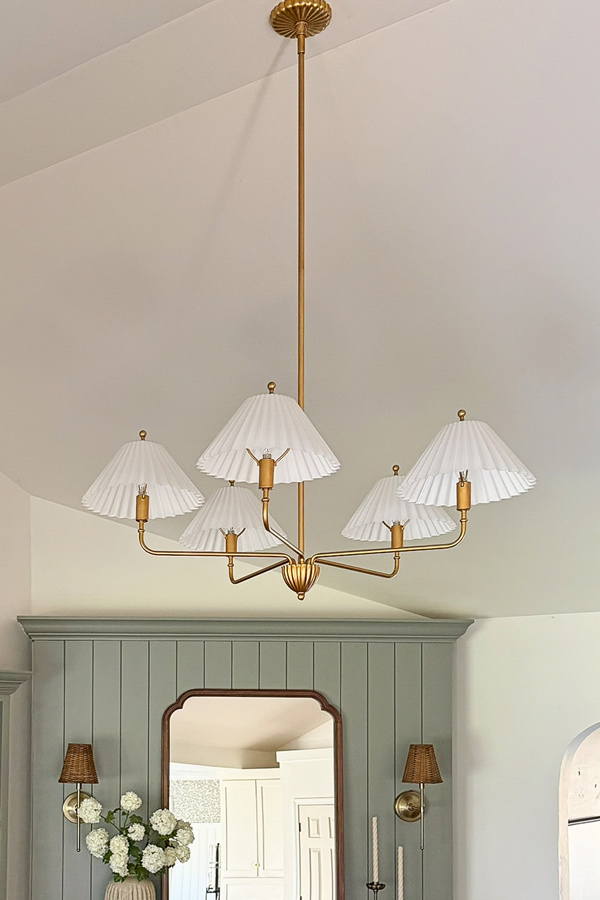 vintage gold chandelier in living room makeover