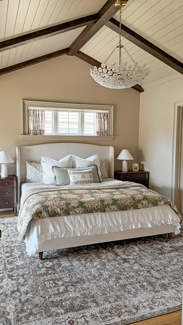 Charming Primary Bedroom Makeover with patterns, florals, wood beams, cozy bedding
