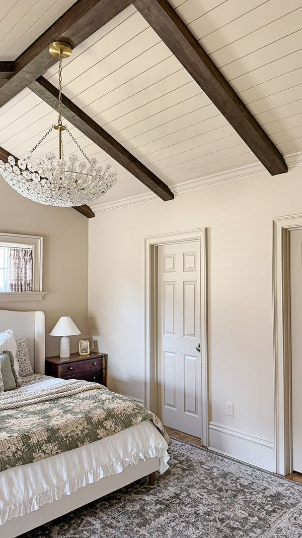 Charming Primary Bedroom Makeover with patterns, florals, wood beams, cozy bedding