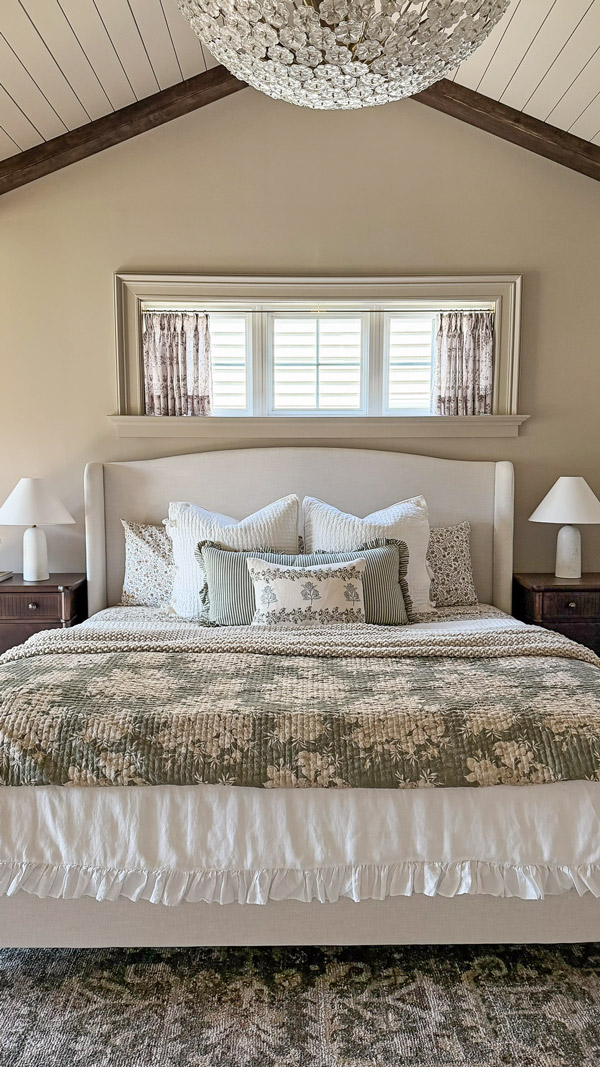 Charming Primary Bedroom Makeover with patterns, florals, wood beams, cozy bedding