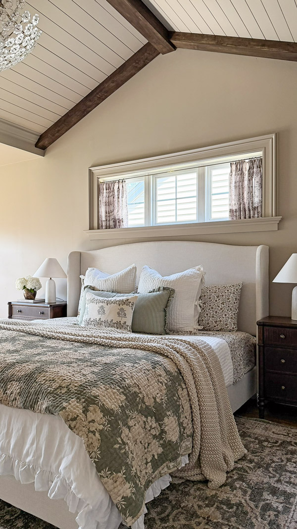 Charming Primary Bedroom Makeover with patterns, florals, wood beams, cozy bedding