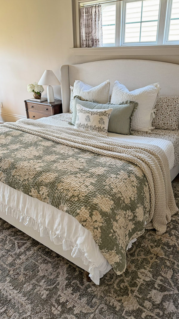 Charming Primary Bedroom Makeover with patterns, florals, wood beams, cozy bedding