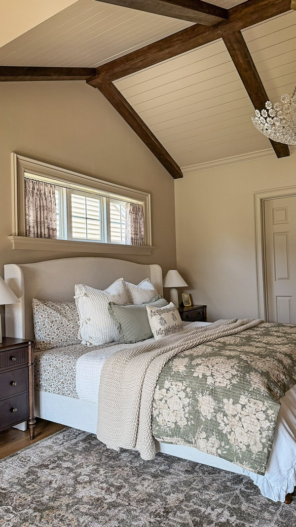 Charming Primary Bedroom Makeover with patterns, florals, wood beams, cozy bedding