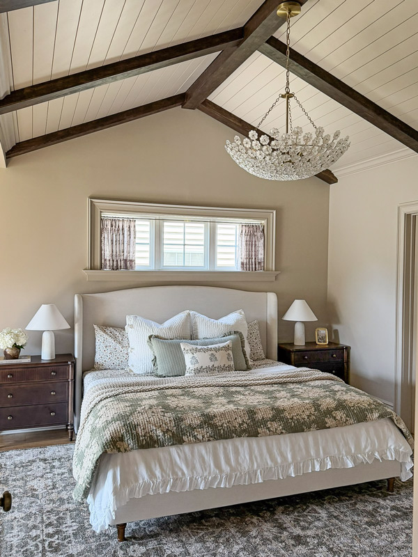 Charming Primary Bedroom Makeover with patterns, florals, wood beams, cozy bedding
