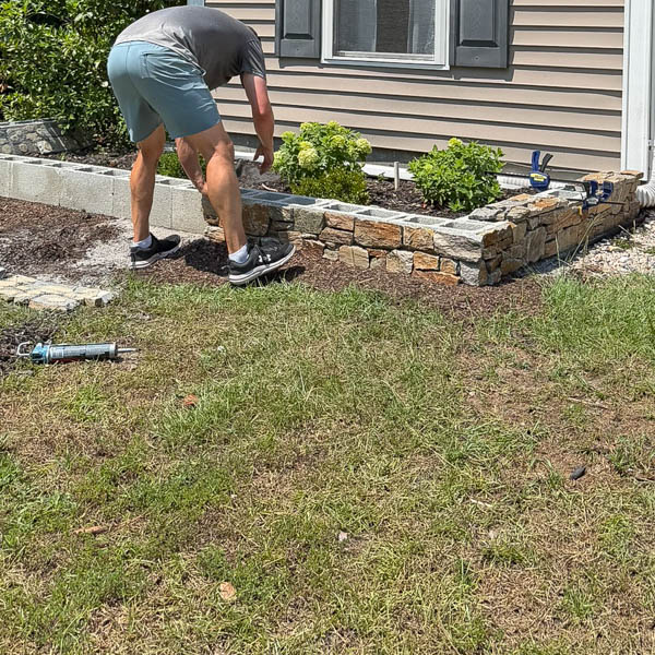 DIY stone wall for garden bed