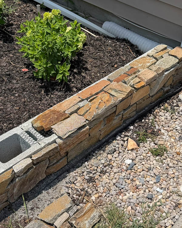 DIY stone wall for garden bed