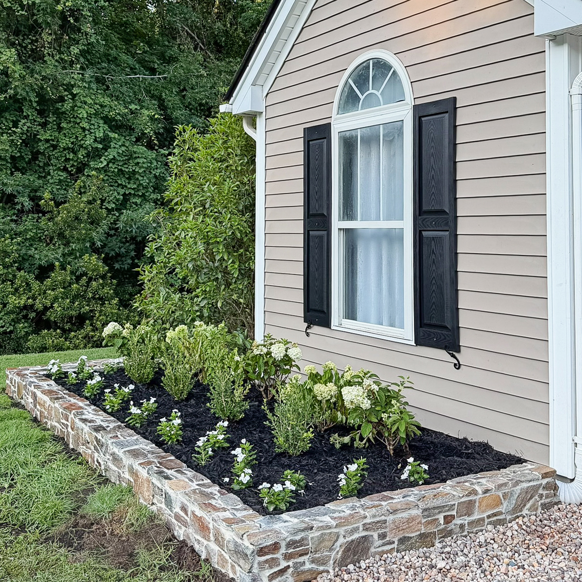 Garden Makeover Adding Curb Appeal with stone garden wall