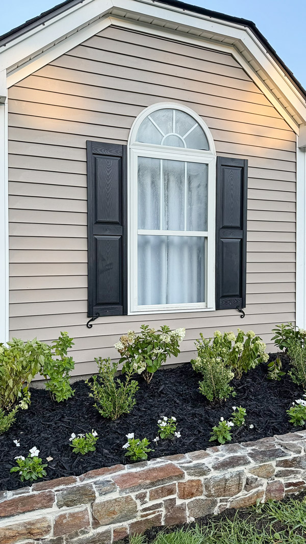 Garden Makeover Adding Curb Appeal with stone garden wall, new shutters, and s hooks