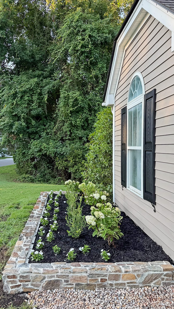 Garden Makeover Adding Curb Appeal with stone garden wall