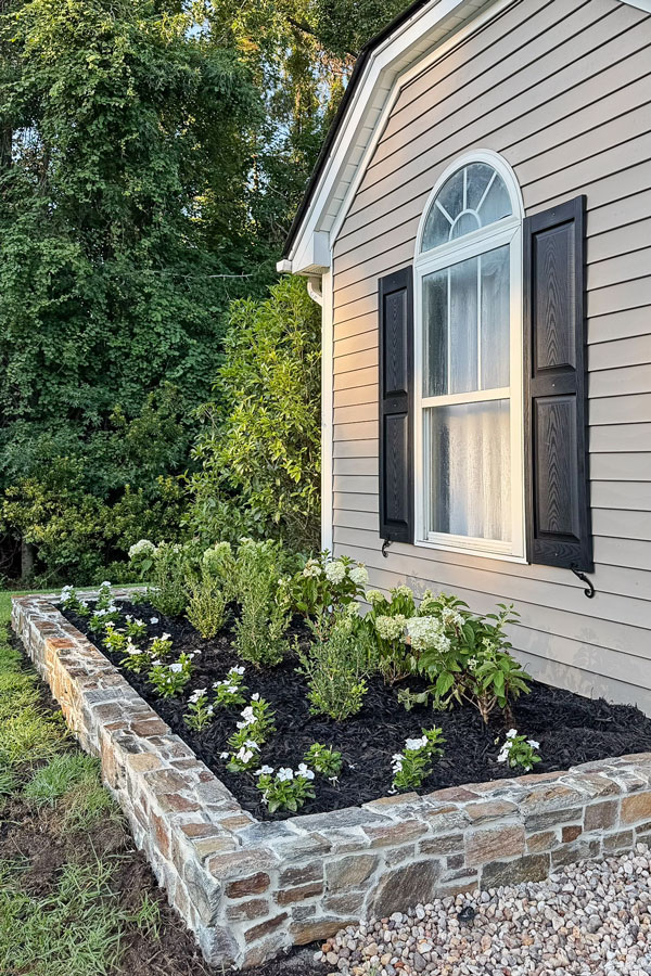 DIY stone wall for garden bed