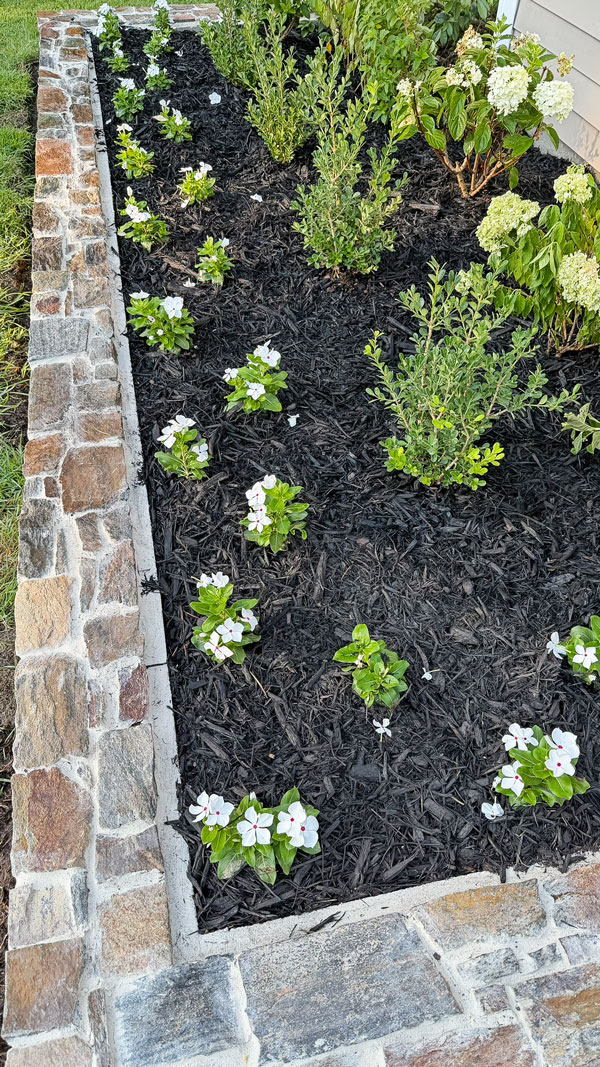 DIY stone wall for garden bed